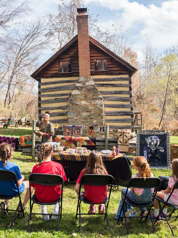 Guests view a demonstration at Oakley Cabin